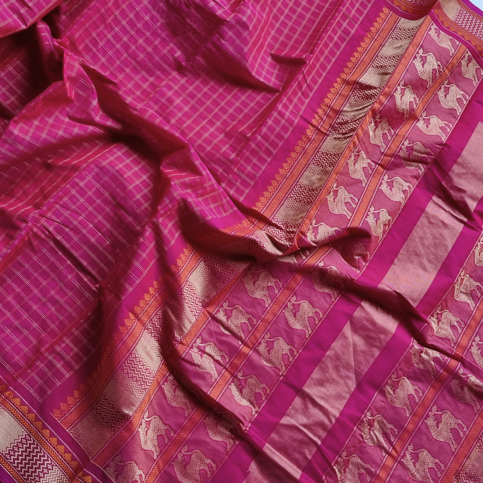 Kanchi Cotton deep pink checked with Yali on pallu