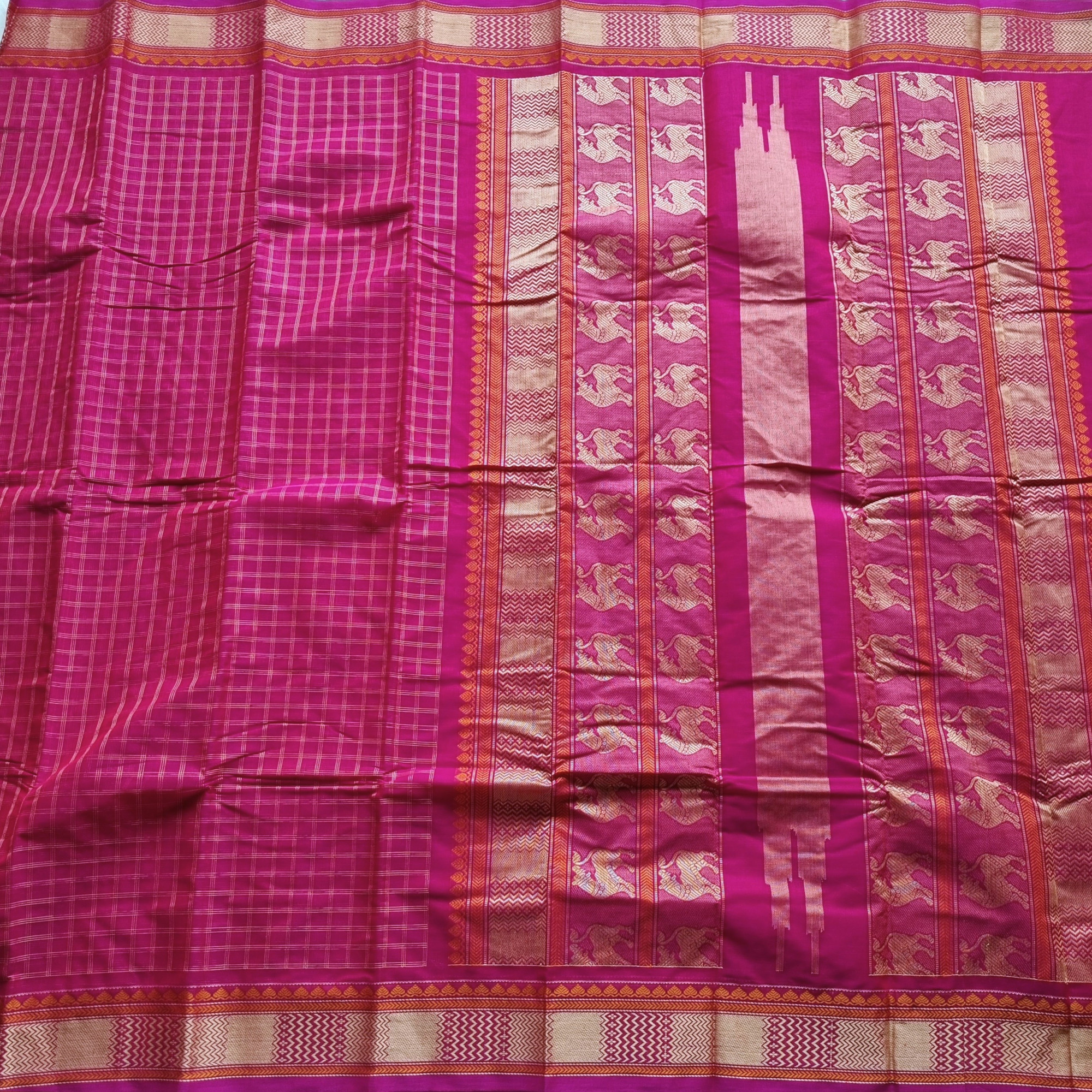 Kanchi Cotton deep pink checked with Yali on pallu