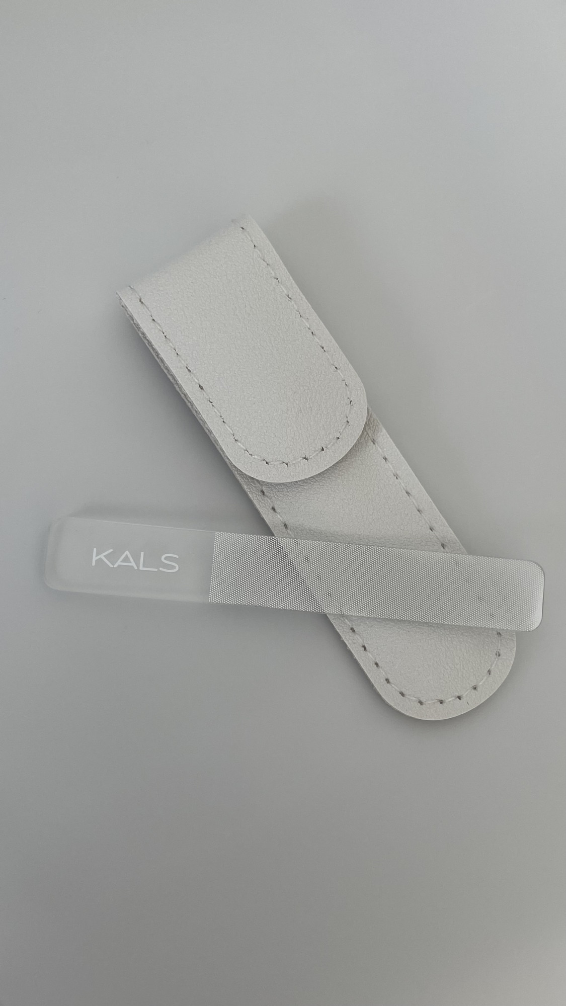      - Glass file with leather case