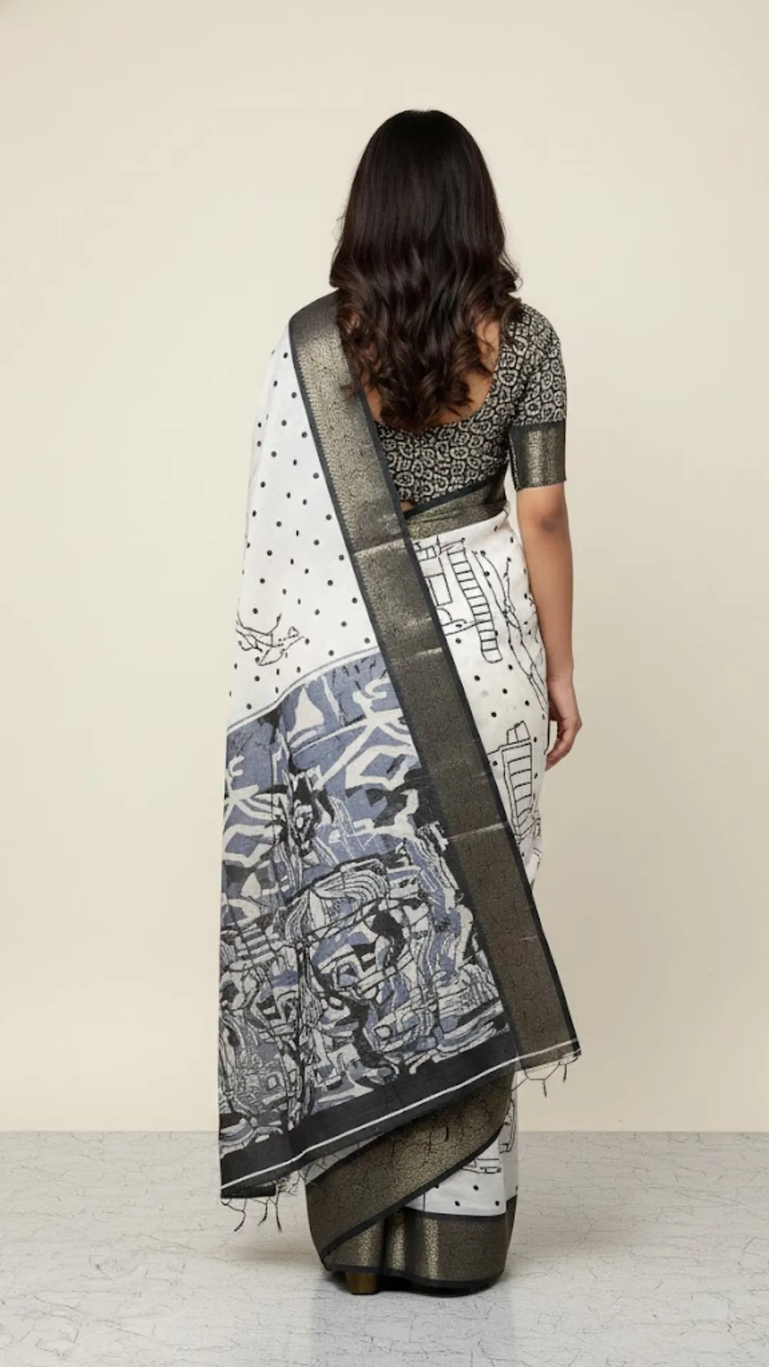 Malti digital printed tussar silk saree with zari motif border