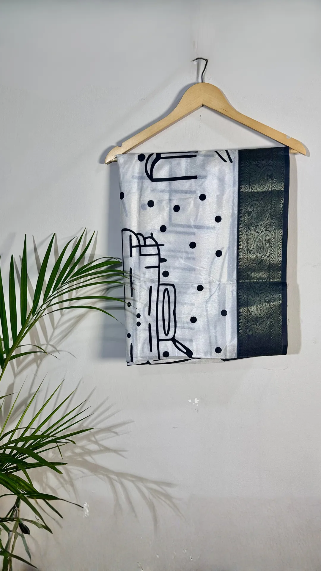 Malti digital printed tussar silk saree with zari motif border