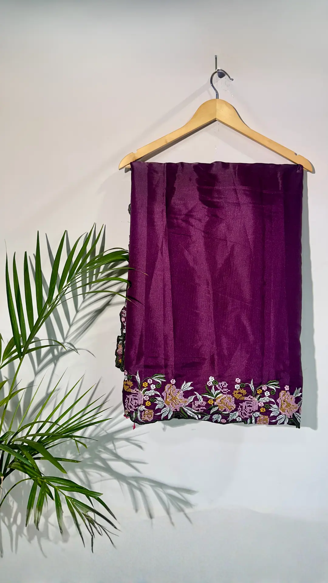 Magenta and Black color fancy tussar silk saree with embroidery cutwork border