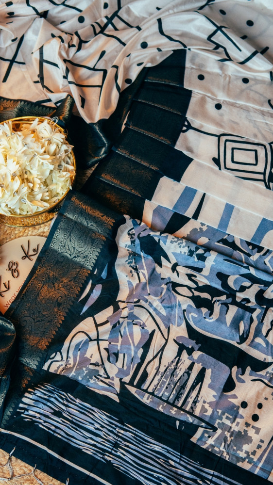 Image of Tussar silk saree with zari motif border