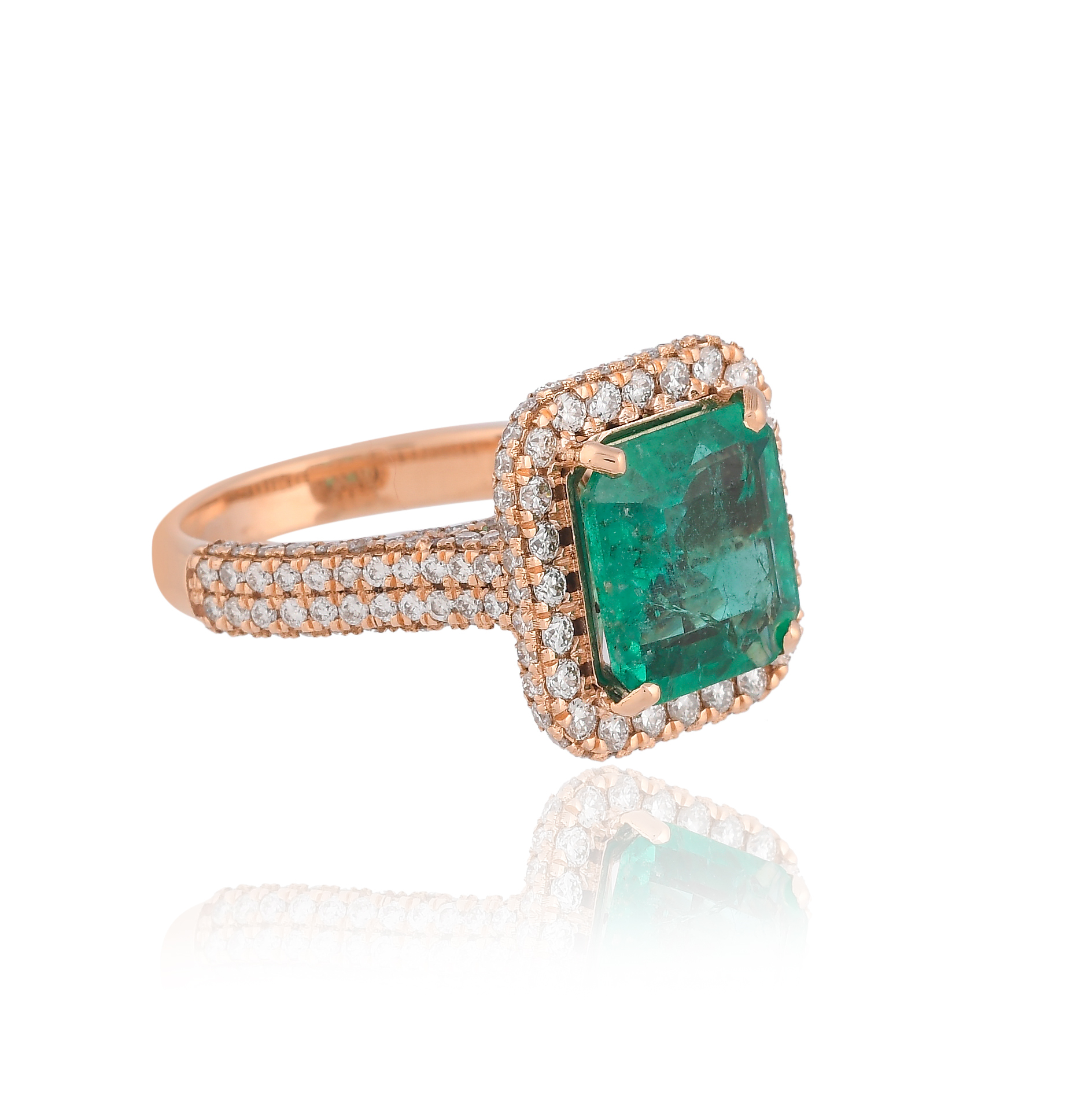 Rose Gold classic emerald halo ring