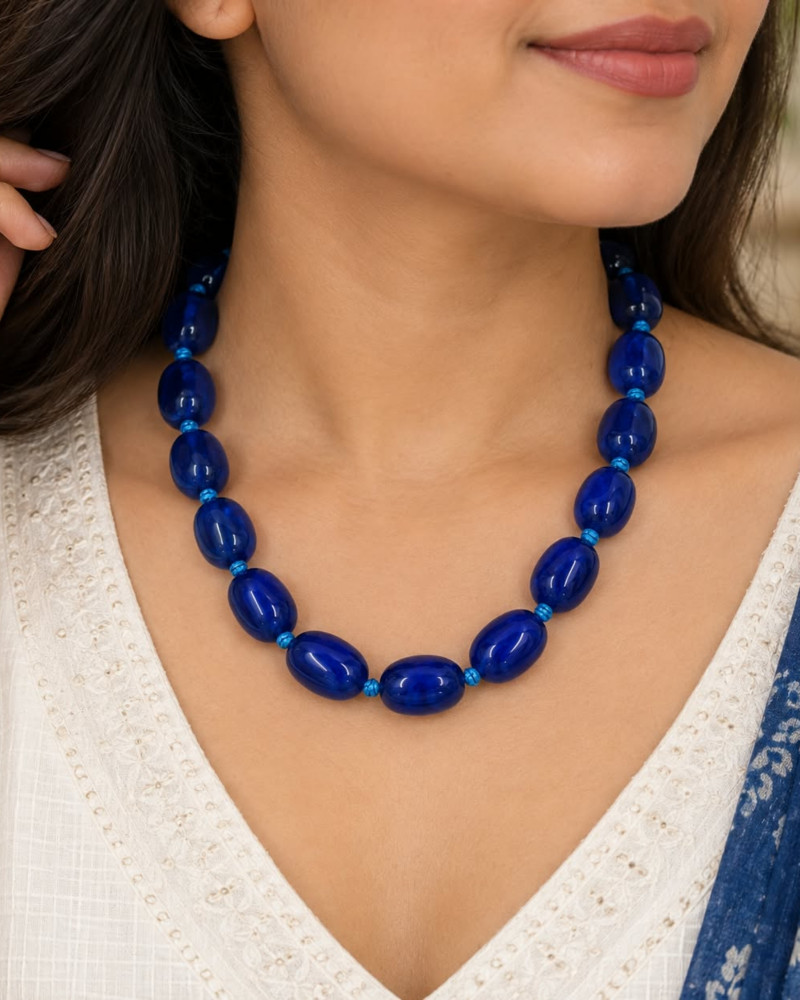 Image of Handcrafted Single-Strand Royal Blue Smooth Oval Beaded Necklace