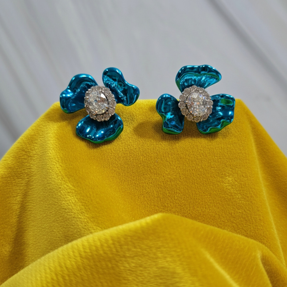 Image of Azure Bloom: Crystal-Encrusted Sky Blue Flower Stud Earrings