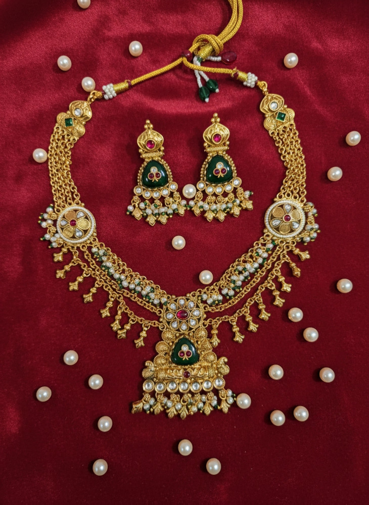 Image of Imperial Heritage: Antique Gold-Plated V-Shape Temple Necklace with Ruby &amp; Emerald Stones