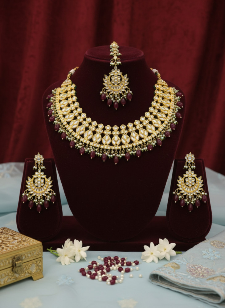 Image of Traditional Gold Plated Kundan Choker Necklace Set with Maang Tikka and Earrings featuring Maroon Bead Droplets