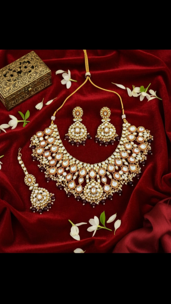 Image of Traditional Gold Plated Polki Kundan Bridal Choker Set with Maang Tikka and Earrings featuring Emerald Green Bead Fringe