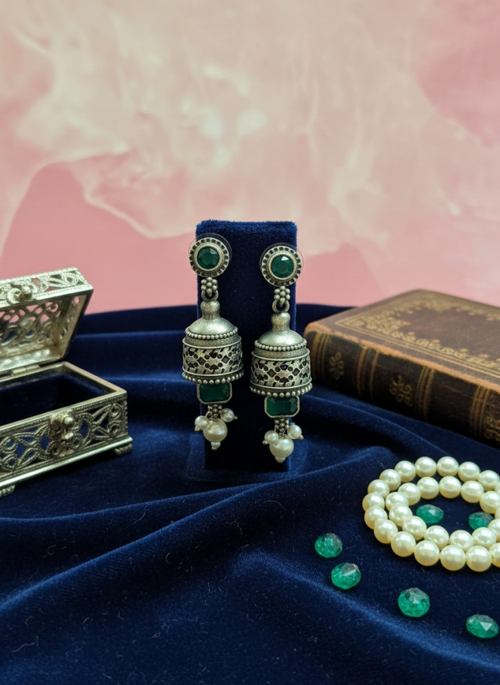 Image of Traditional Oxidized Silver Jhumka Earrings with Emerald Green Stones