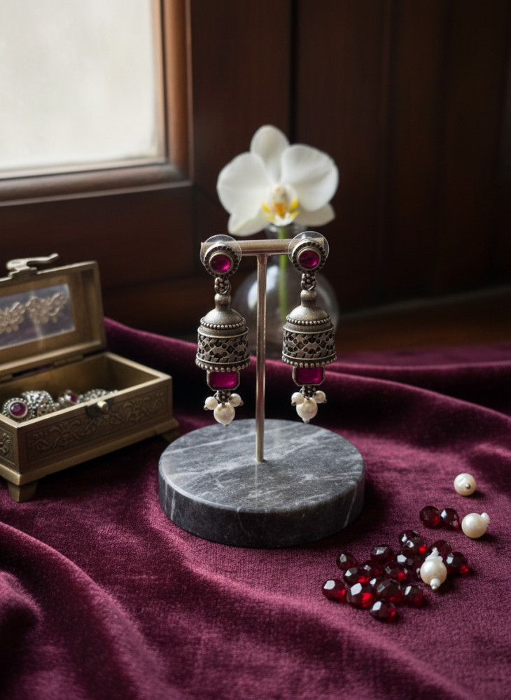 Image of Traditional Oxidized Silver Jhumka Earrings with Ruby-Pink Stones