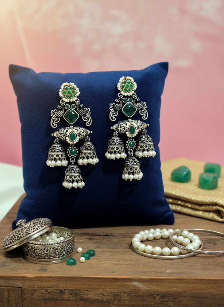 Image of Traditional Oxidized Silver Triple Layer Jhumka Earrings with Green Stones