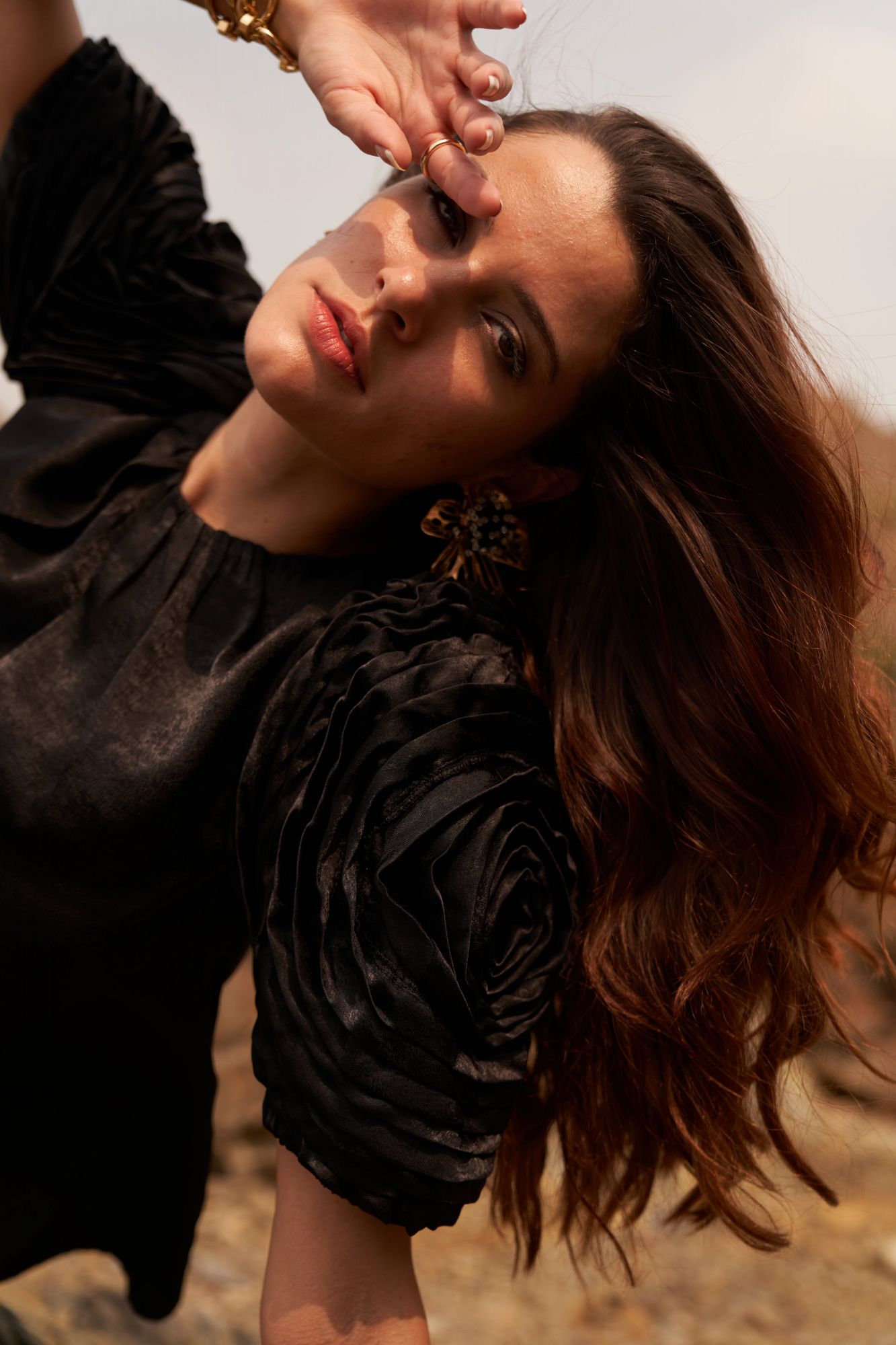 DESERT ROSE BLACK SATIN CREPE STATEMENT TOP WITH ROUND NECK AND DETAILED SLEEVES