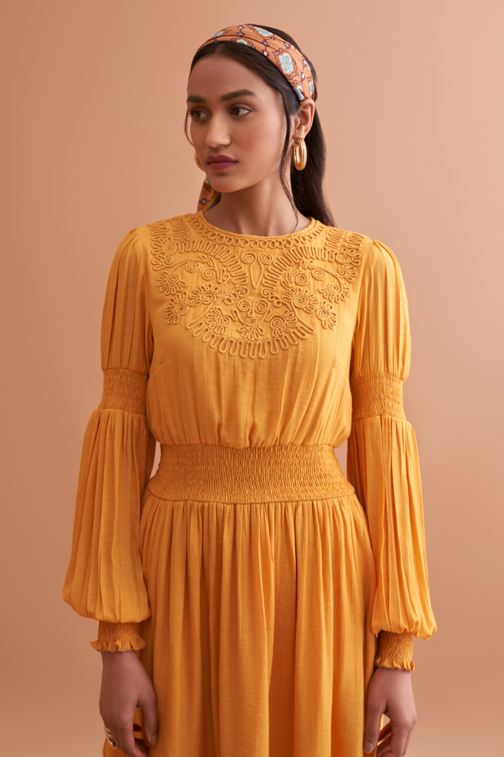 AMALFI SOLID YELLOW TEXTURED RAYON CREPE KNEE LENGTH DRESS WITH HAND EMBROIDERED NECK