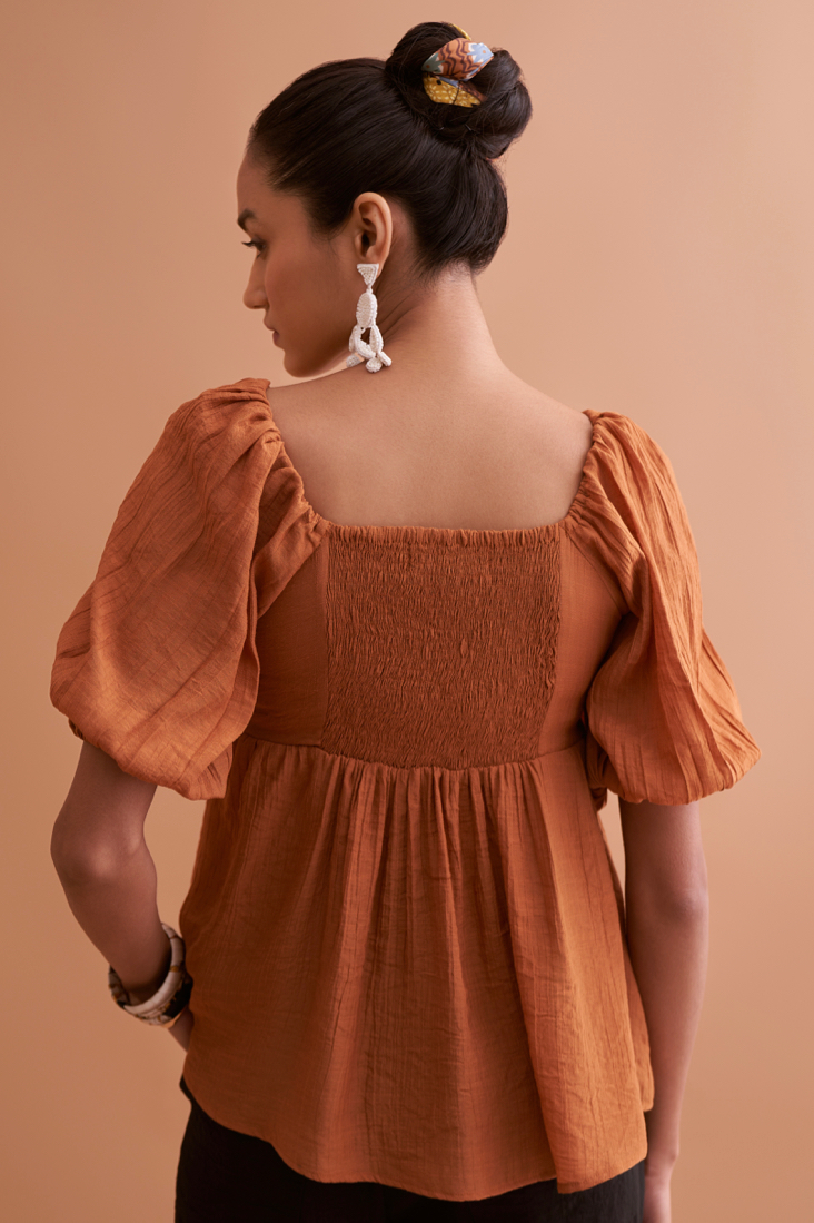 AMALFI SOLID BROWN RAYON CREPE TEXTURED FABRIC SUMMER TOP WITH SHORT SLEEVES AND EMBROIDERED NECK