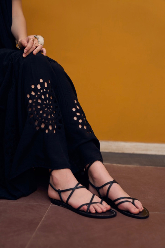 SOLID BLACK TEXTURED RAYON CREPE SLEEVELESS MAXI DRESS WITH POCKETS AND CUTWORK HAND EMBROIDERY AT HEM