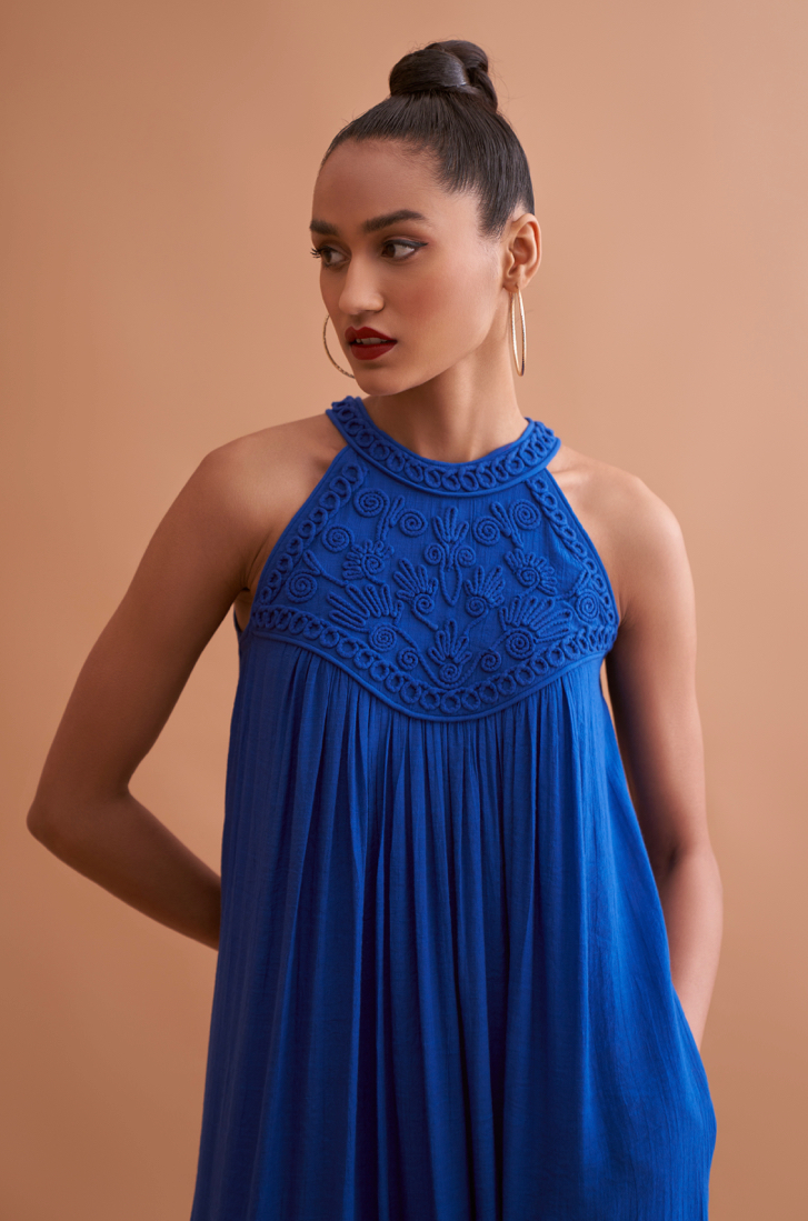 AMALFI SOLID BLUE TEXTURED RAYON CREPE SLEEVELESS MAXI DRESS WITH HAND EMBROIDERED NECK