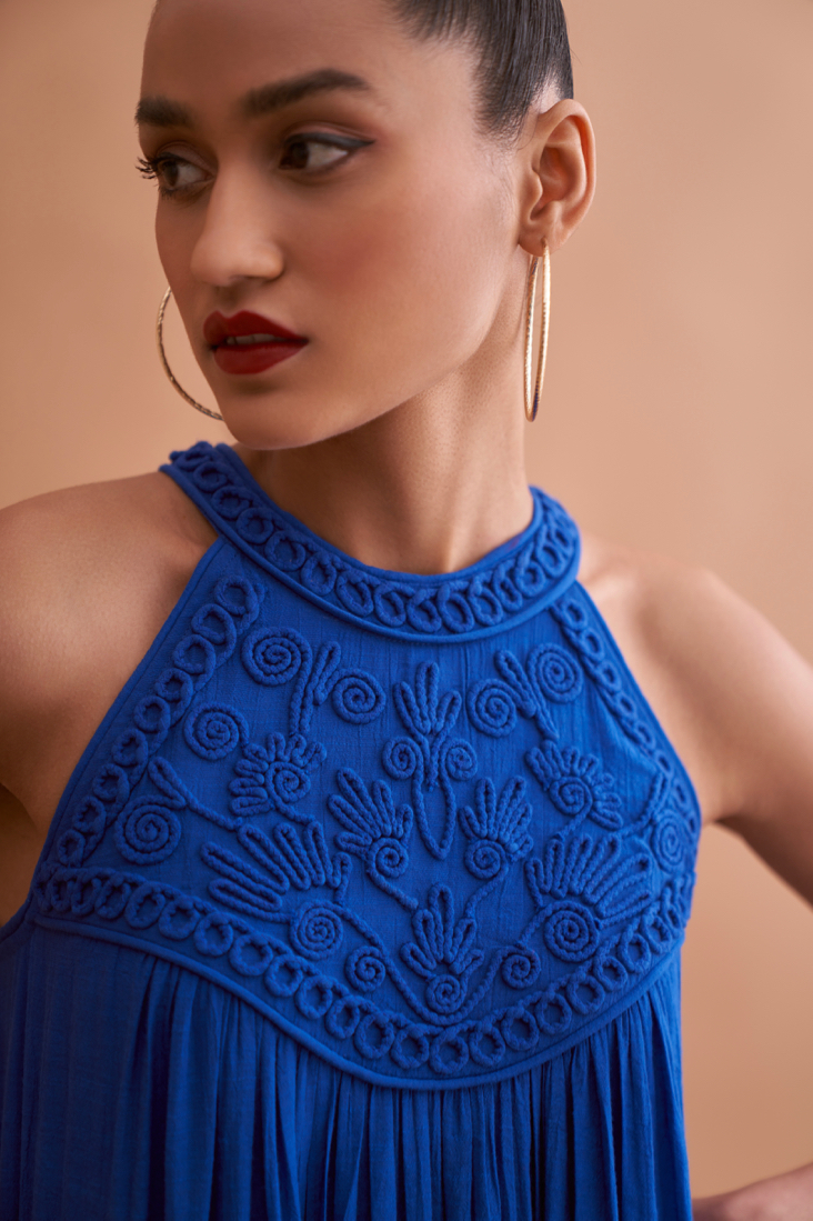 AMALFI SOLID BLUE TEXTURED RAYON CREPE SLEEVELESS MAXI DRESS WITH HAND EMBROIDERED NECK