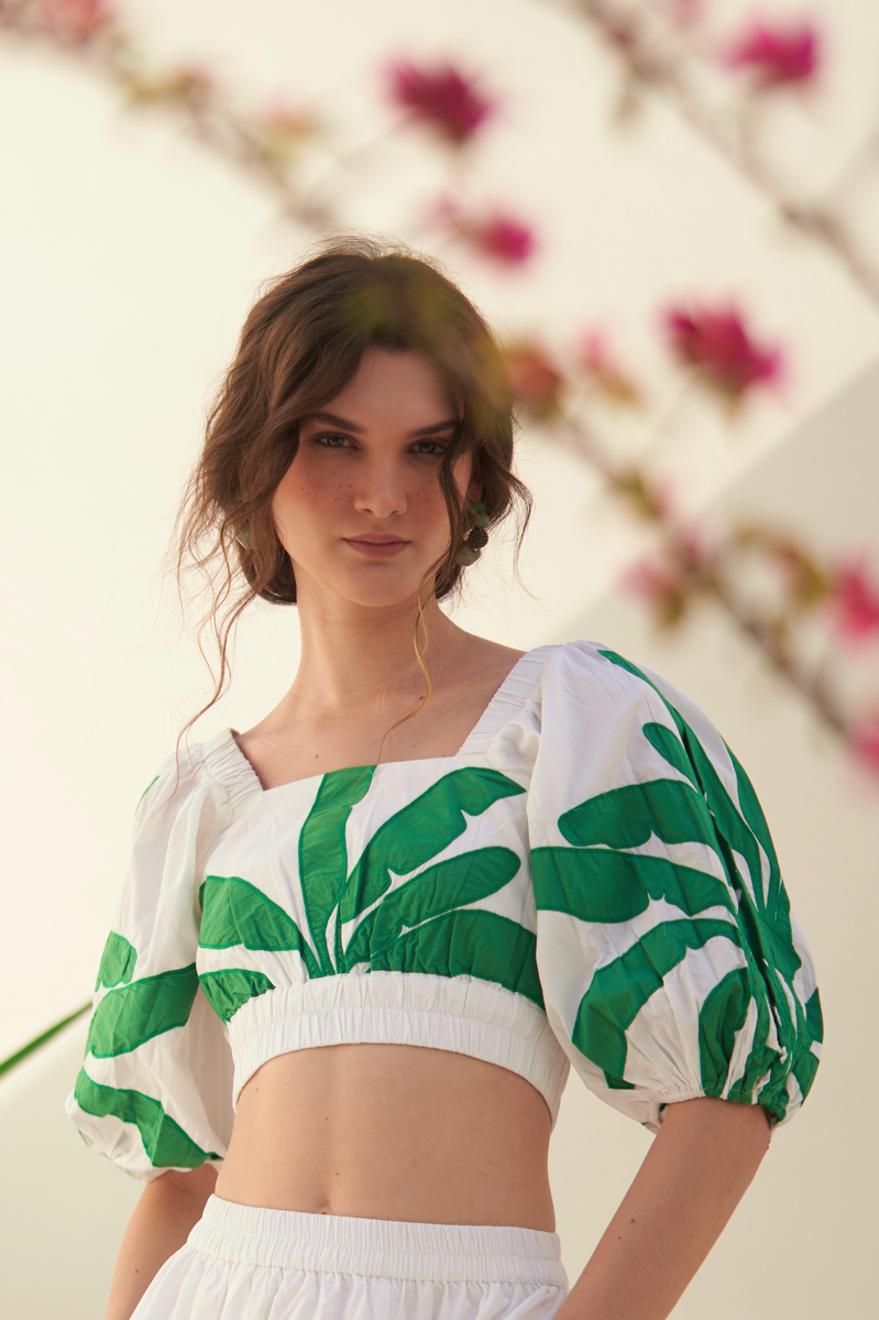 MALIBU WHITE COTTON SUMMER CROP TOP WITH INTERESTING BACK CUT AND GREEN FABRIC APPLIQU EMBROIDERY