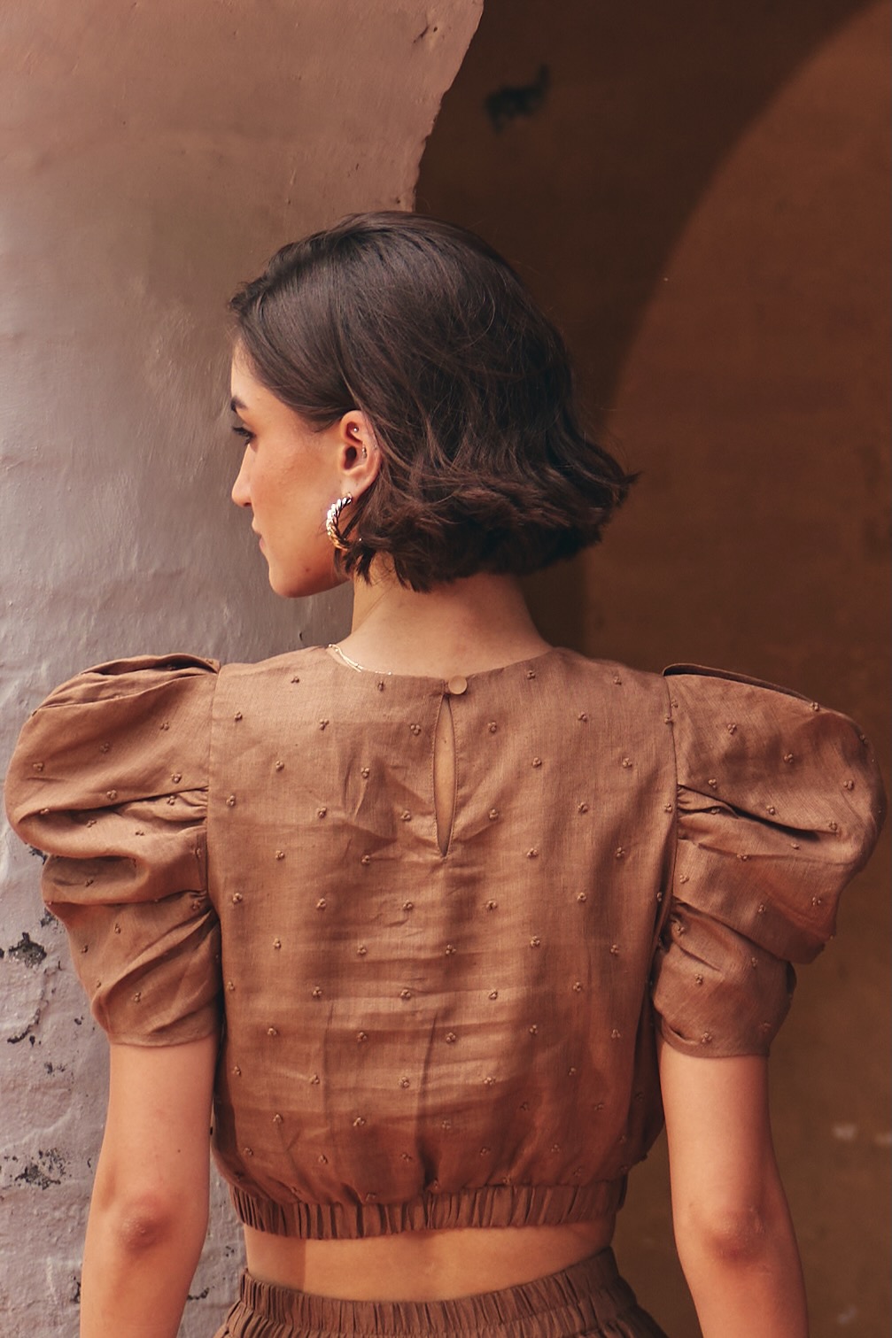FLORENTINA SOLID BROWN PURE LINEN CROP LENGTH TOP WITH SLEEVES AND KNOT EMBROIDERY ALL OVER