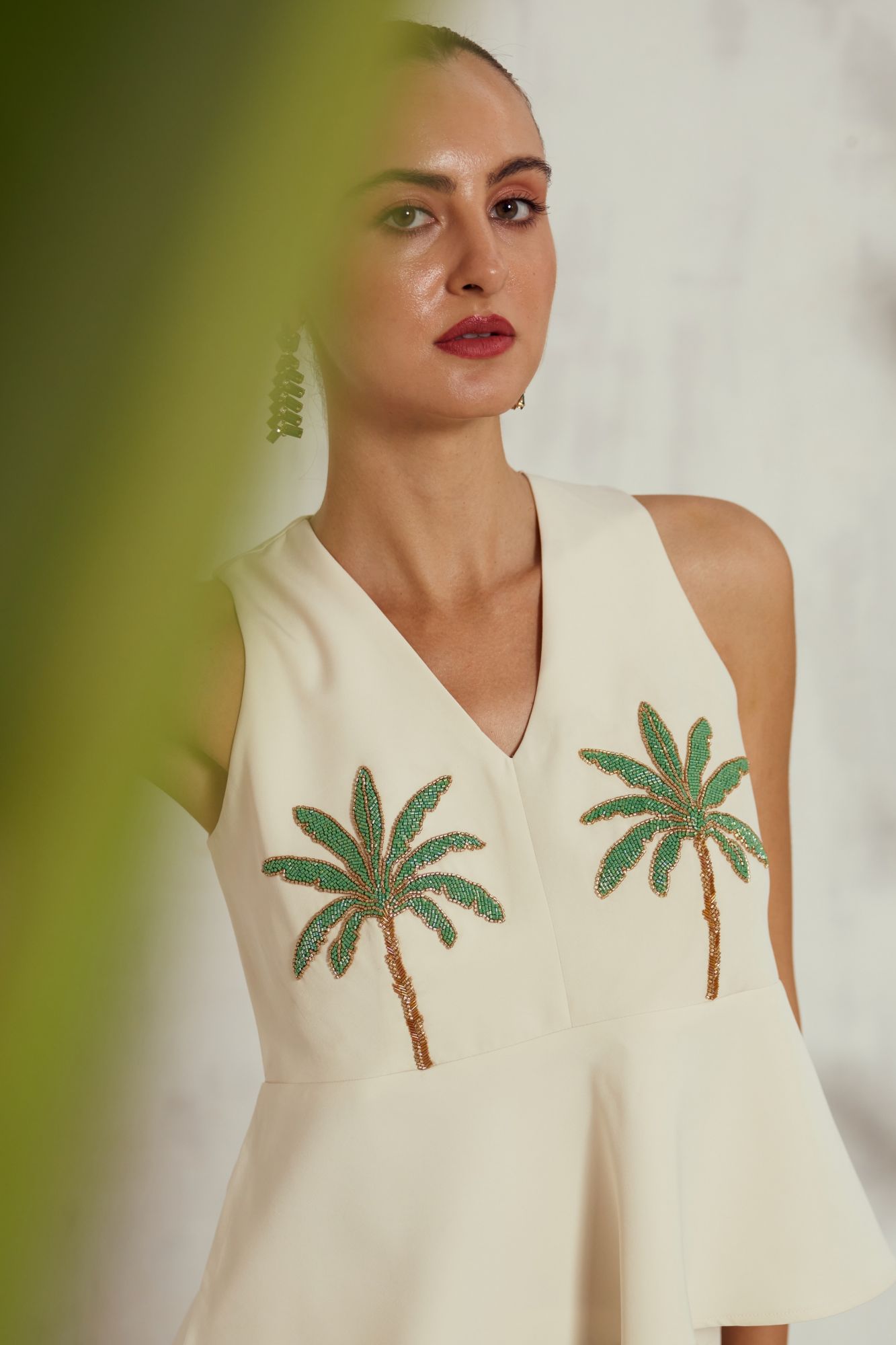 MALIBU-02 OFF WHITE COLOR SLEEVELESS PEPLUM TOP WITH HAND EMBROIDERY