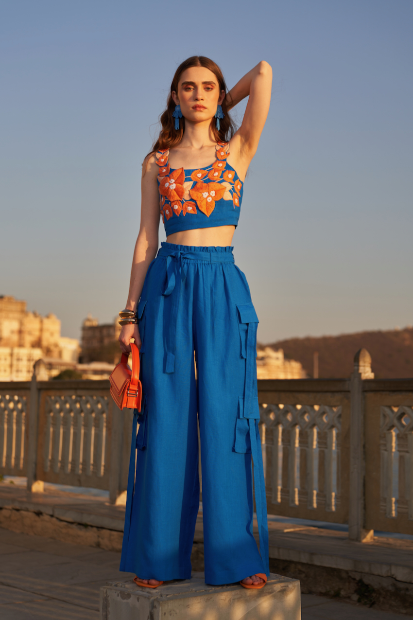 LA FLOR COBALT BLUE BOUGAINVILLEA THREE DIMENSIONAL CHUNKY HAND EMBROIDERED BUSTIER AND SOLID CARGO PANTS CO-ORDINATE