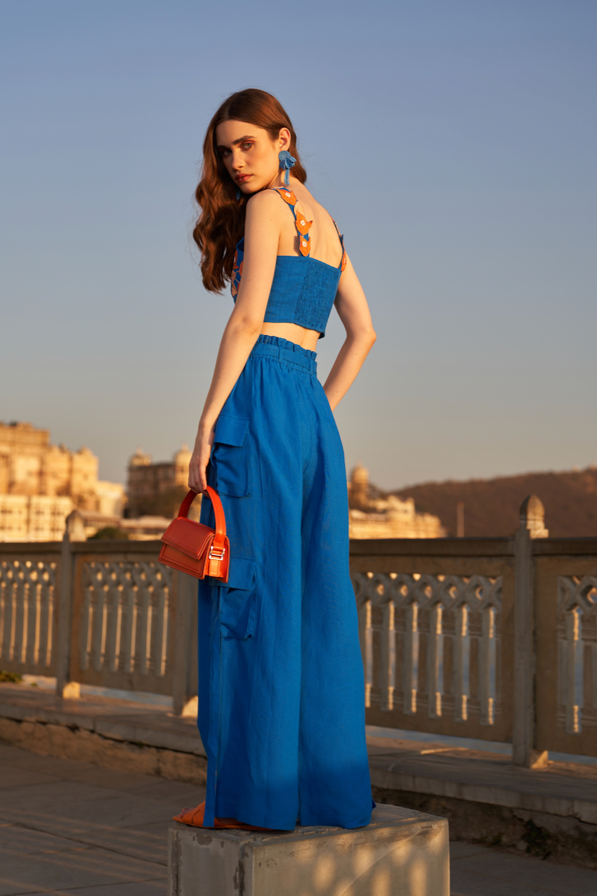 LA FLOR COBALT BLUE BOUGAINVILLEA THREE DIMENSIONAL CHUNKY HAND EMBROIDERED BUSTIER AND SOLID CARGO PANTS CO-ORDINATE