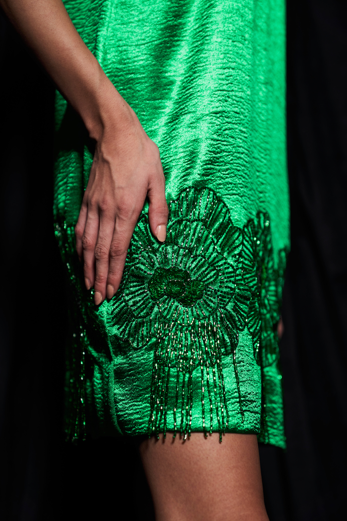 LEILA EMERALD GREEN KNEE LENGTH SLEEVELESS DRESS WITH BACK NECK TIE AND GLISTENING GLASS BEADS HAND EMBROIDERY HEM