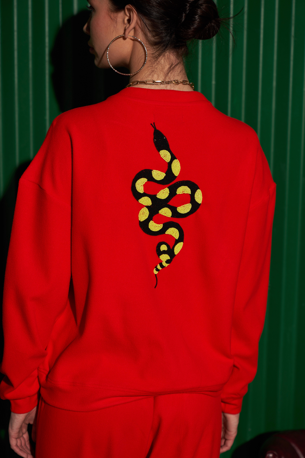 MATERIAL GIRL RED COLOR FLEECE WITH EXCLUSIVE PYTHON HAND EMBROIDERY WINTER SWEATSHIRT