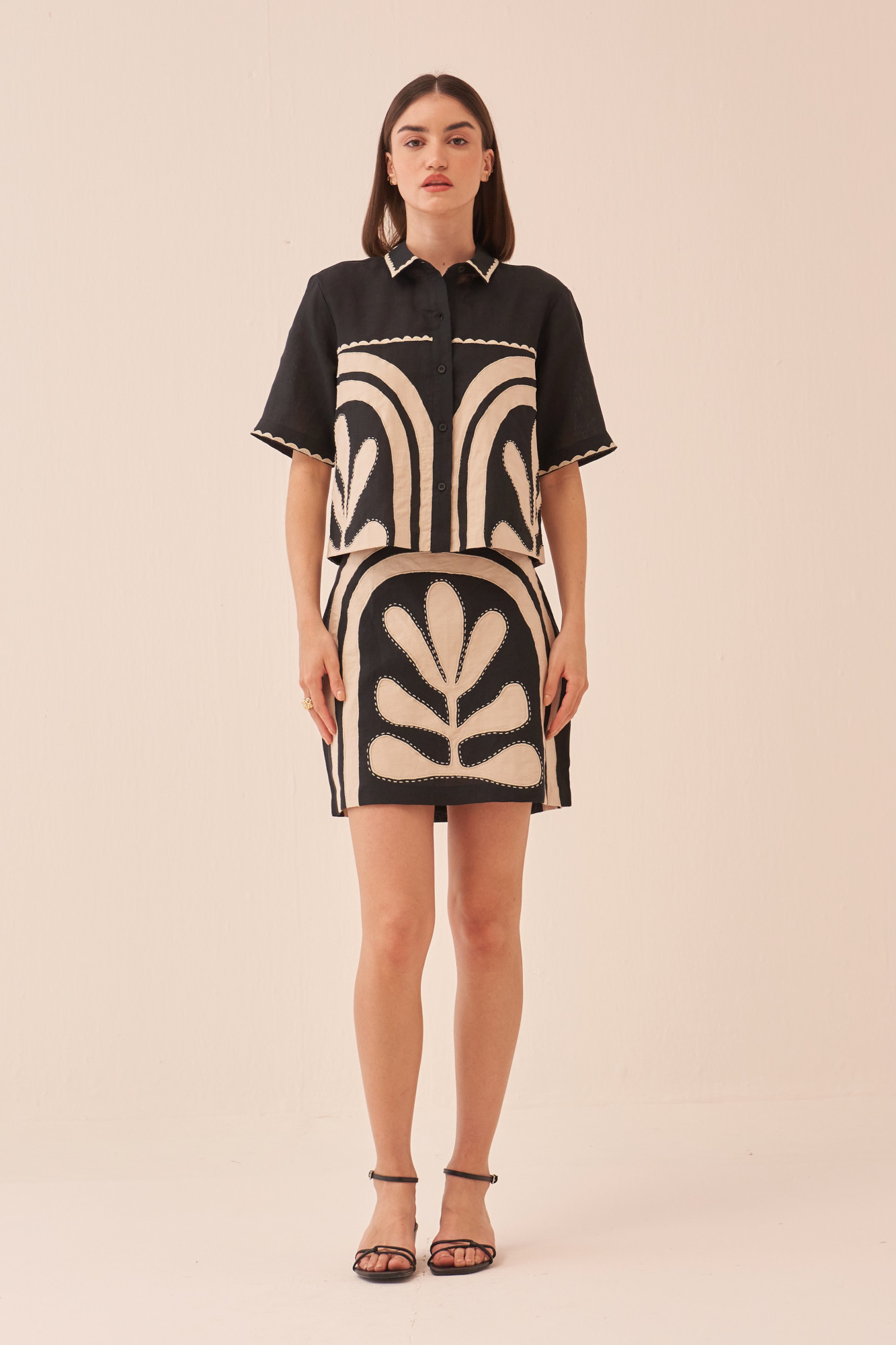 CASABLANCA BLACK COTTON LINEN CROP LENGTH SHIRT AND SKIRT CO-ORD SET WITH APPLIQUE EMBROIDERY