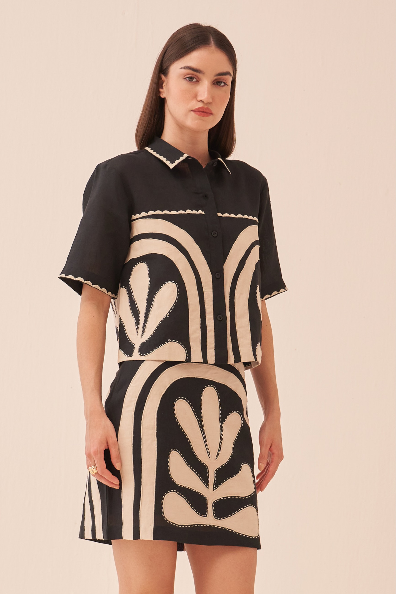 CASABLANCA BLACK COTTON LINEN CROP LENGTH SHIRT AND SKIRT CO-ORD SET WITH APPLIQUE EMBROIDERY