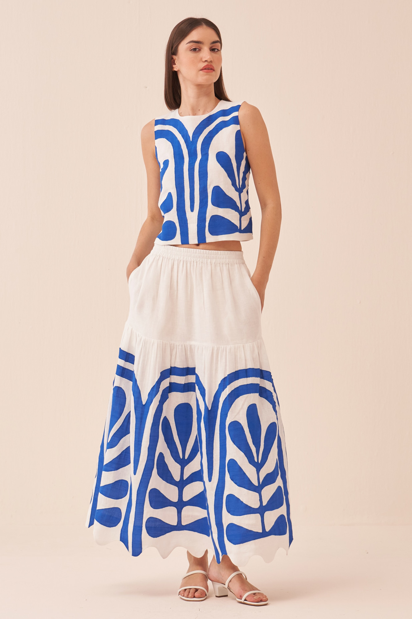 CASABLANCA WHITE COTTON LINEN MIDI LENGTH SKIRT AND SLEEVELESS TOP WITH BLUE COLOUR APPLIQUE EMBROIDERY