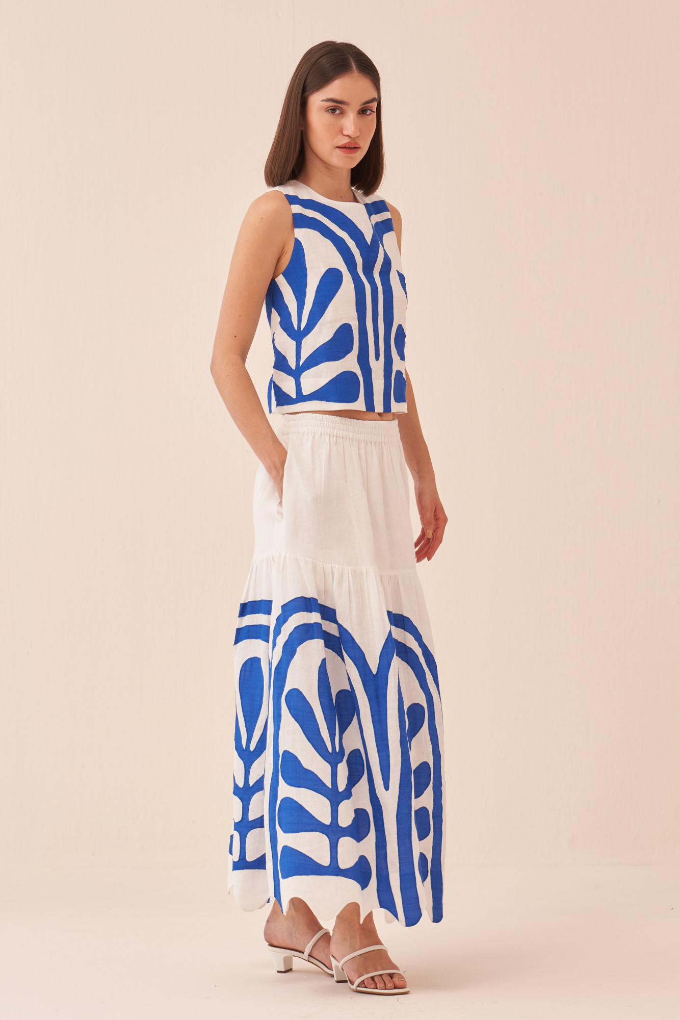 CASABLANCA WHITE COTTON LINEN MIDI LENGTH SKIRT AND SLEEVELESS TOP WITH BLUE COLOUR APPLIQUE EMBROIDERY
