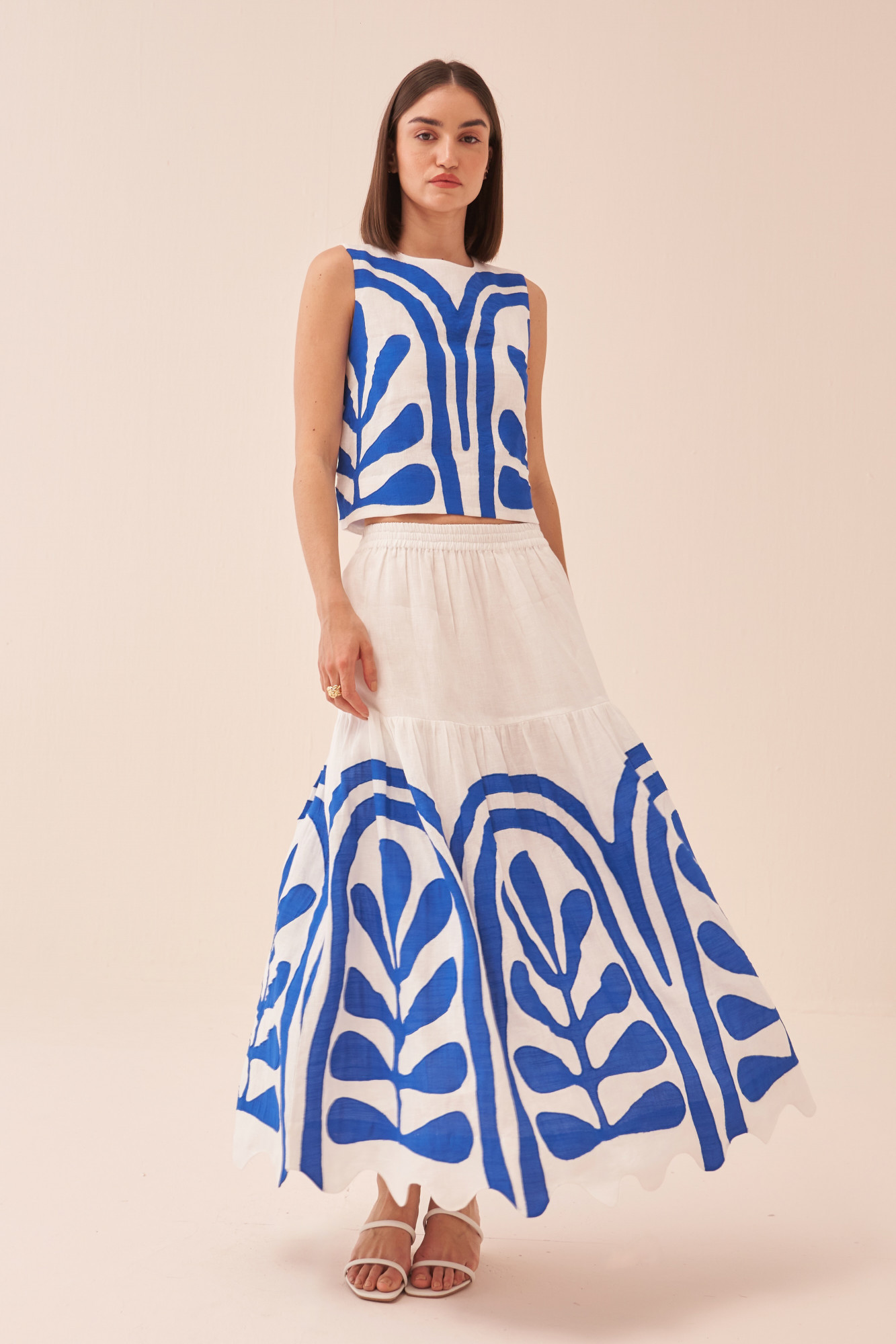 CASABLANCA WHITE COTTON LINEN MIDI LENGTH SKIRT AND SLEEVELESS TOP WITH BLUE COLOUR APPLIQUE EMBROIDERY
