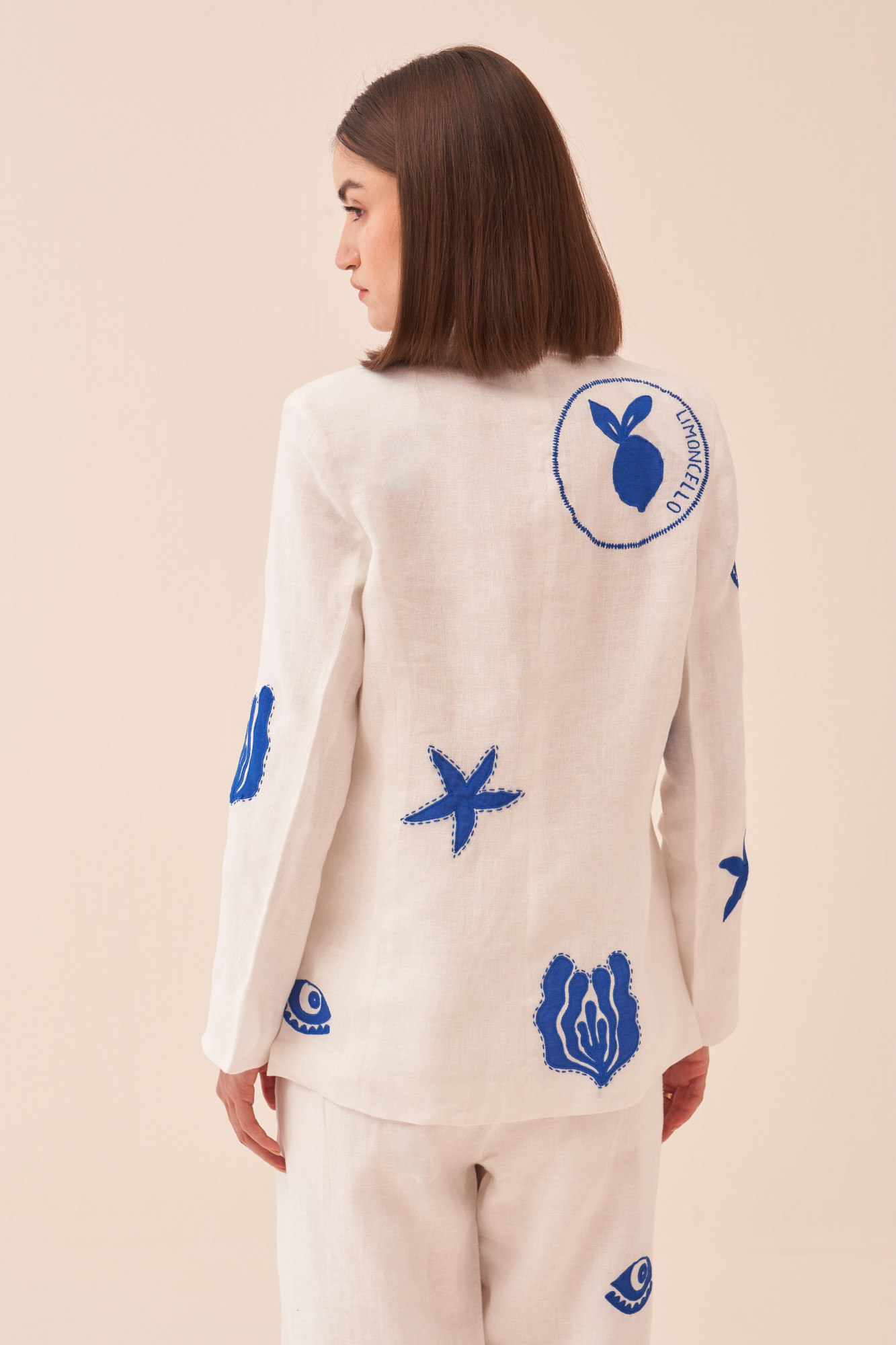 CASABLANCA WHITE COTTON LINEN JACKET AND PANT CO-ORD SET WITH BLUE COLOUR APPLIQUE EMBROIDERY