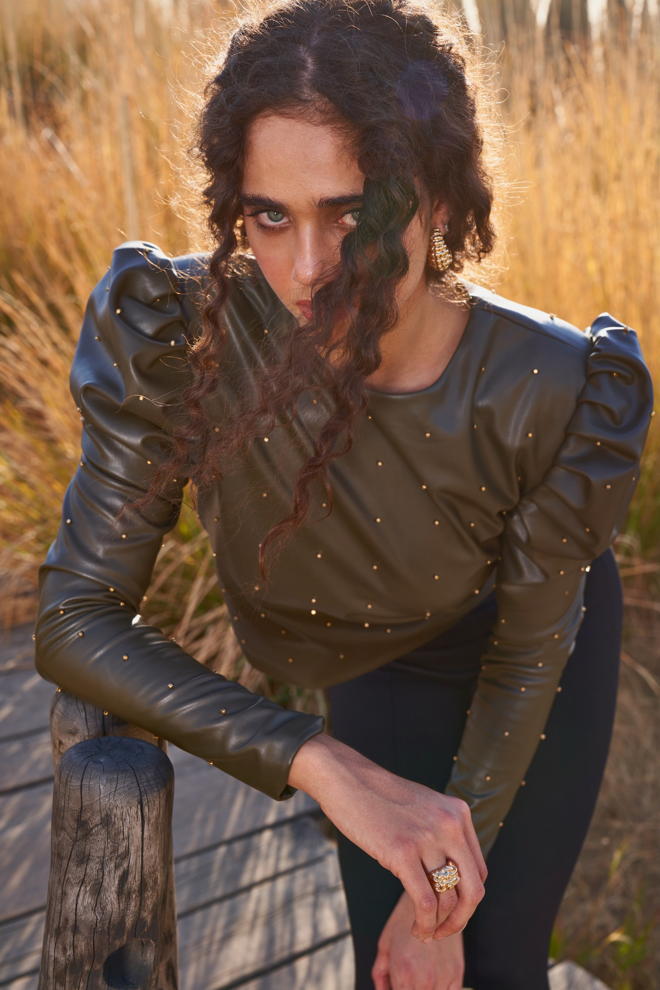 MATERIAL GIRL 03 DARK OLIVE FAUX LEATHER STUDDED PEPLUM TOP WITH FULL LENGTH SLEEVES