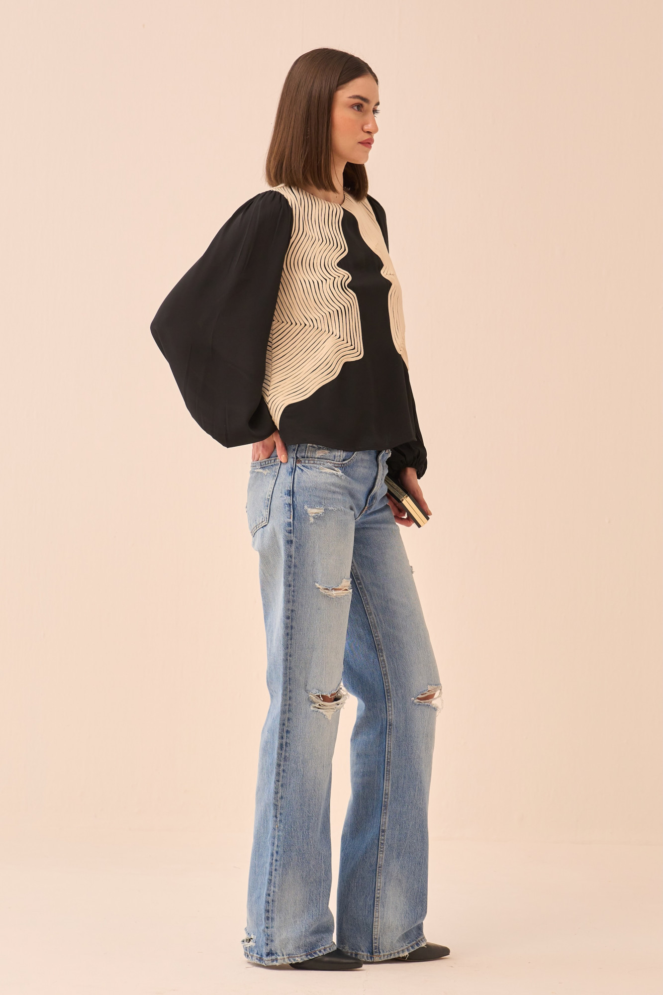 CASABLANCA BLACK COLOUR TOP WITH FULL LENGTH SLEEVES AND CREAM COLOUR PIPING DETAILING