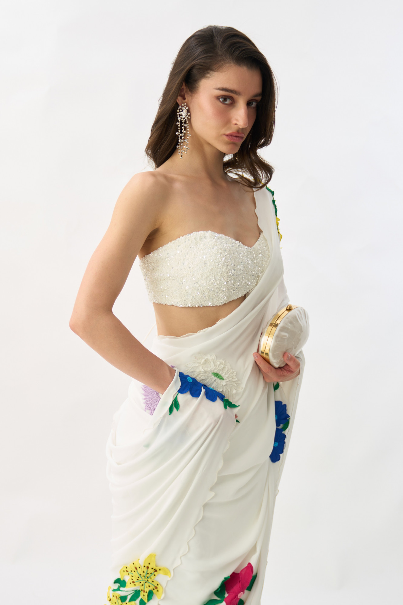 GARDEN OF SICILIA WHITE SARI WITH DELICATE FLORAL EMBROIDERY AND FULLY SEUINED BUSTIER BLOUSE