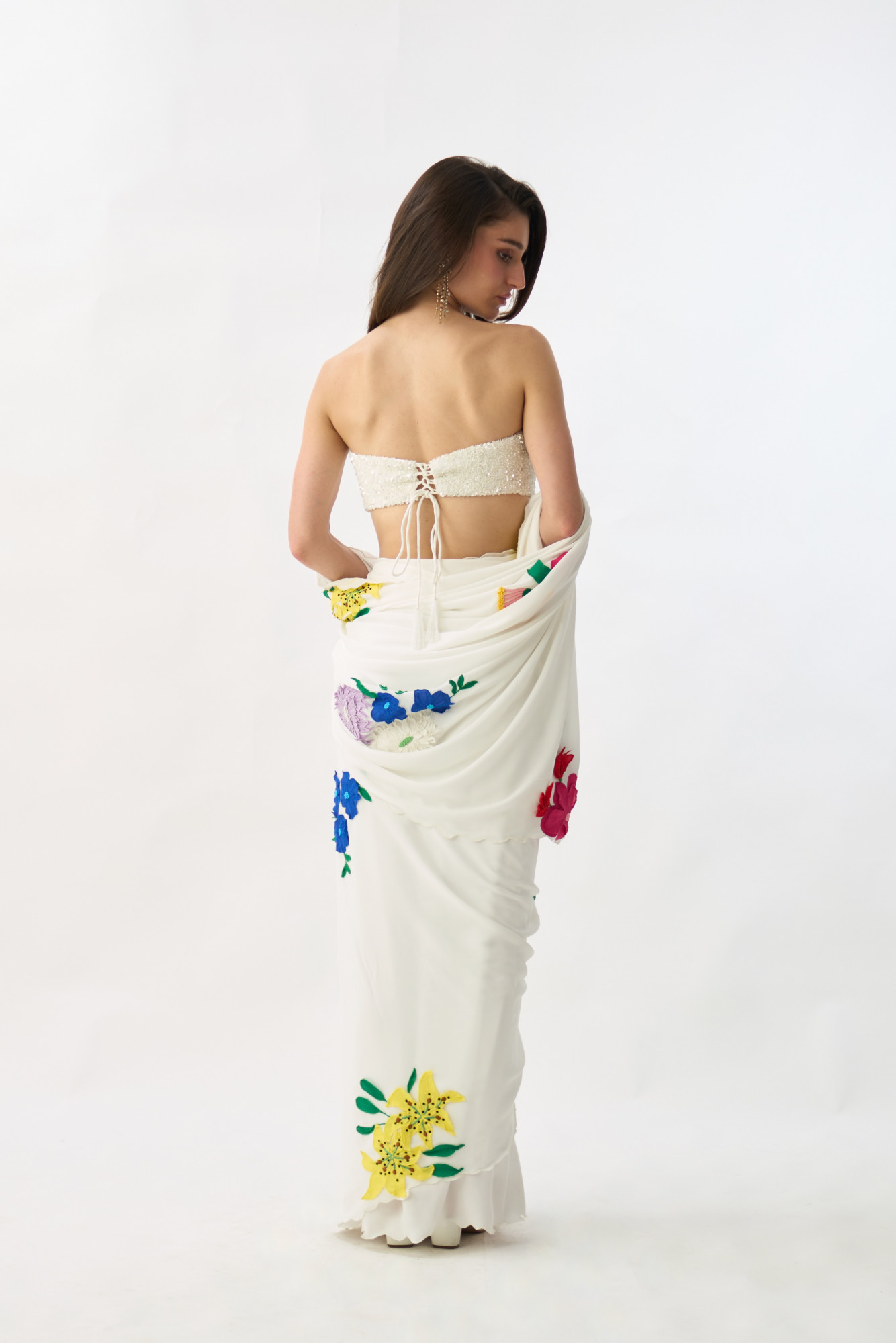 GARDEN OF SICILIA WHITE SARI WITH DELICATE FLORAL EMBROIDERY AND FULLY SEUINED BUSTIER BLOUSE