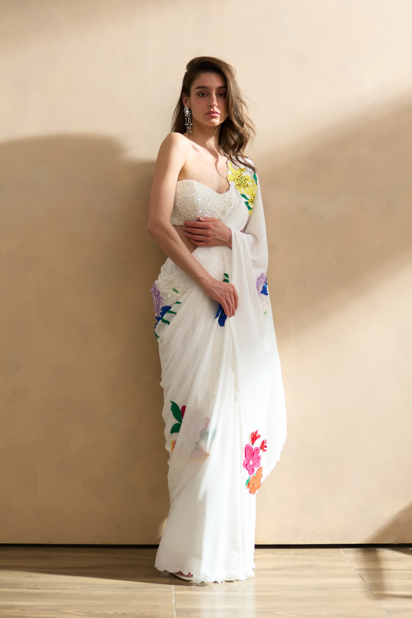 GARDEN OF SICILIA WHITE SARI WITH DELICATE FLORAL EMBROIDERY AND FULLY SEUINED BUSTIER BLOUSE