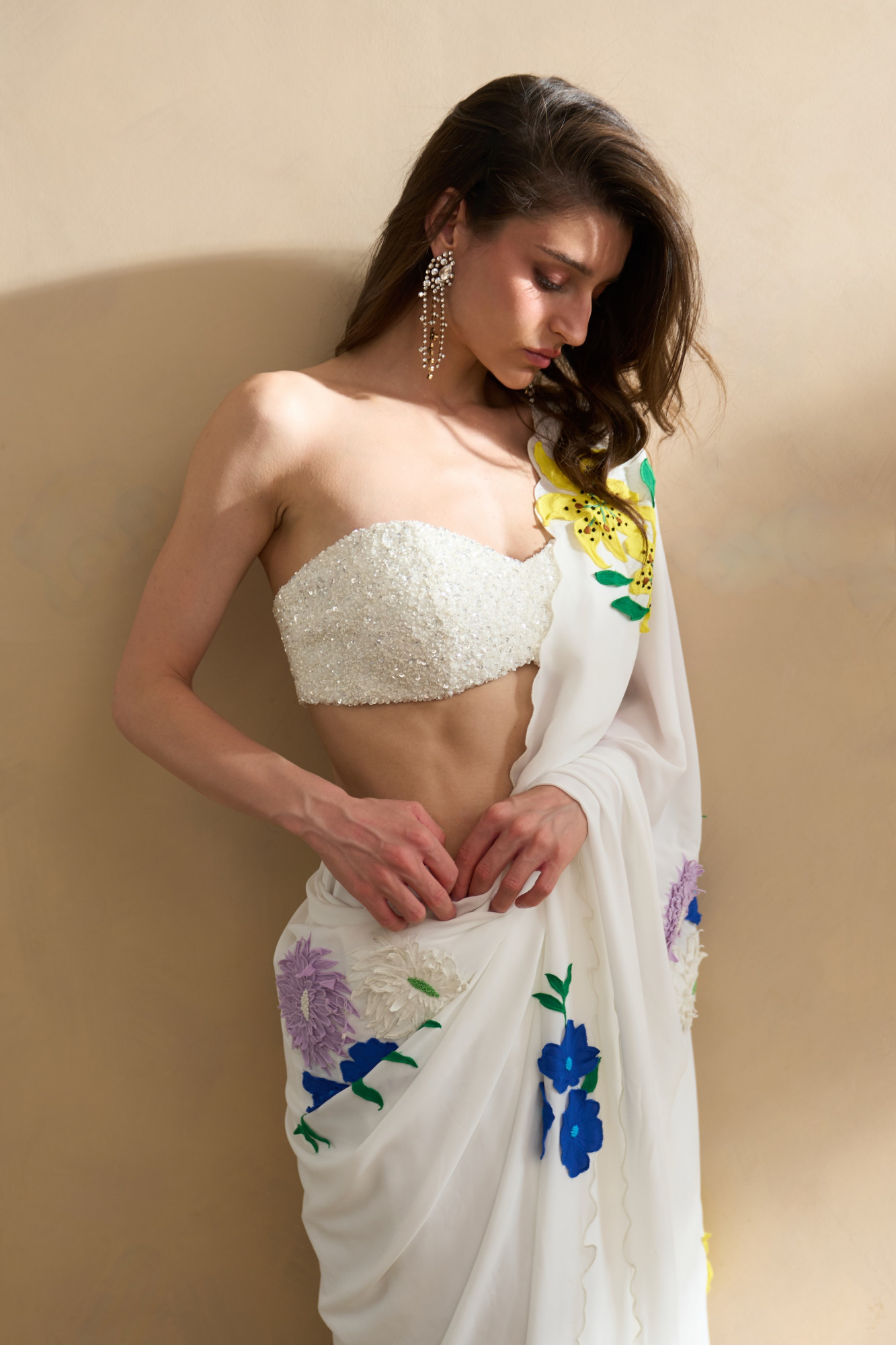 GARDEN OF SICILIA WHITE SARI WITH DELICATE FLORAL EMBROIDERY AND FULLY SEUINED BUSTIER BLOUSE