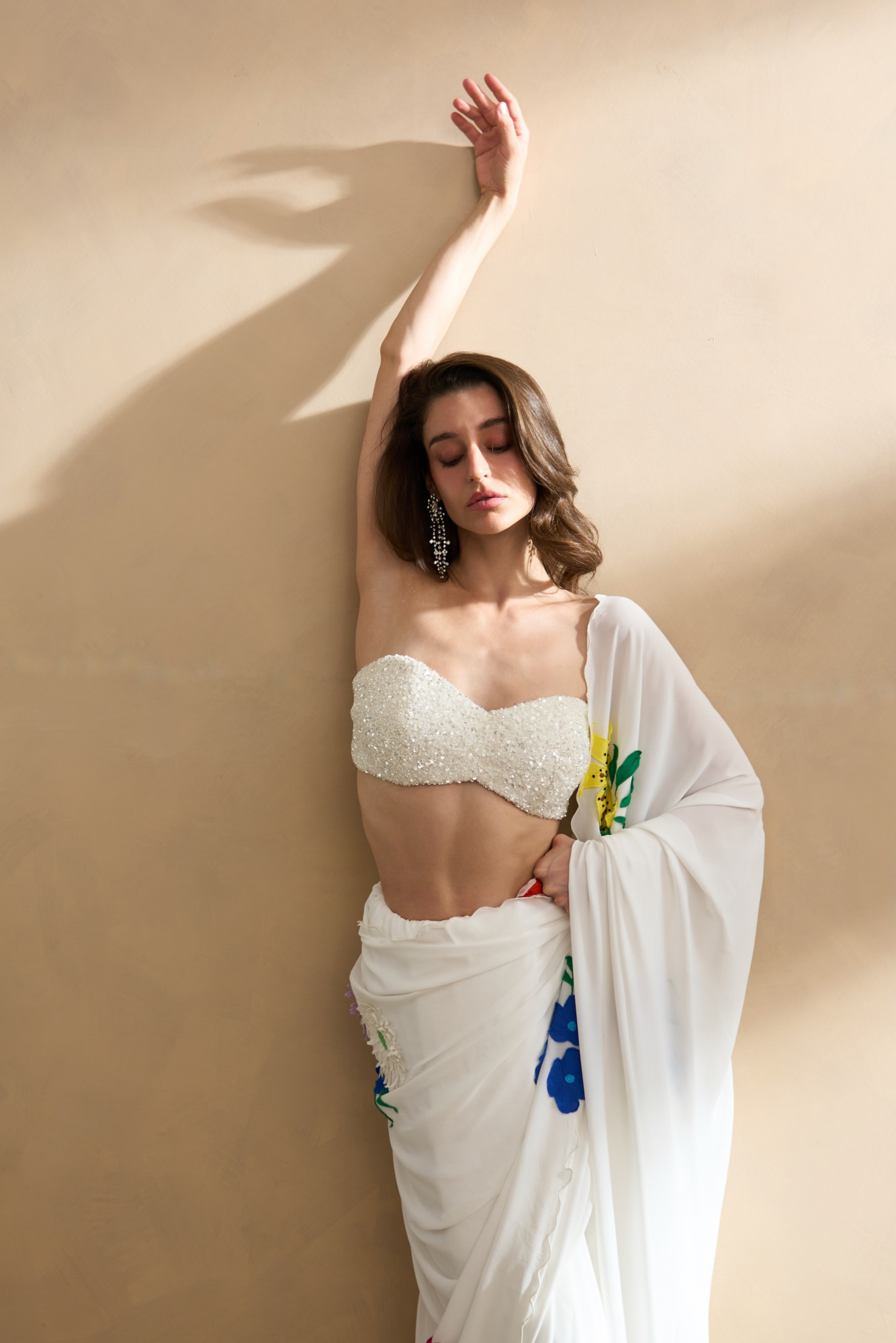 GARDEN OF SICILIA WHITE SARI WITH DELICATE FLORAL EMBROIDERY AND FULLY SEUINED BUSTIER BLOUSE