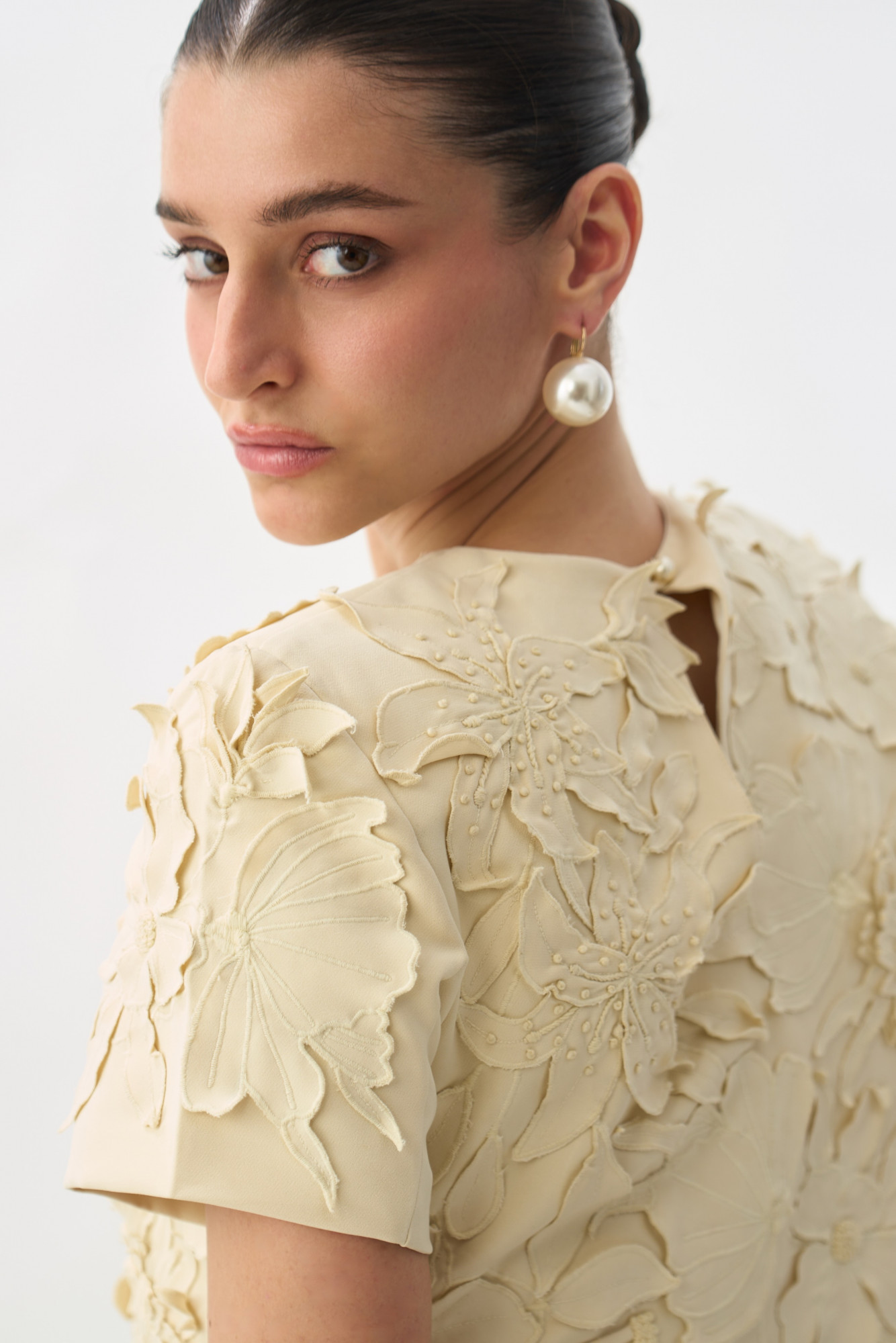 GARDEN OF SICILIA CREAM COLOUR CROP LENGTH STATEMENT TOP WITH DELICATE FLORAL EMBROIDERY