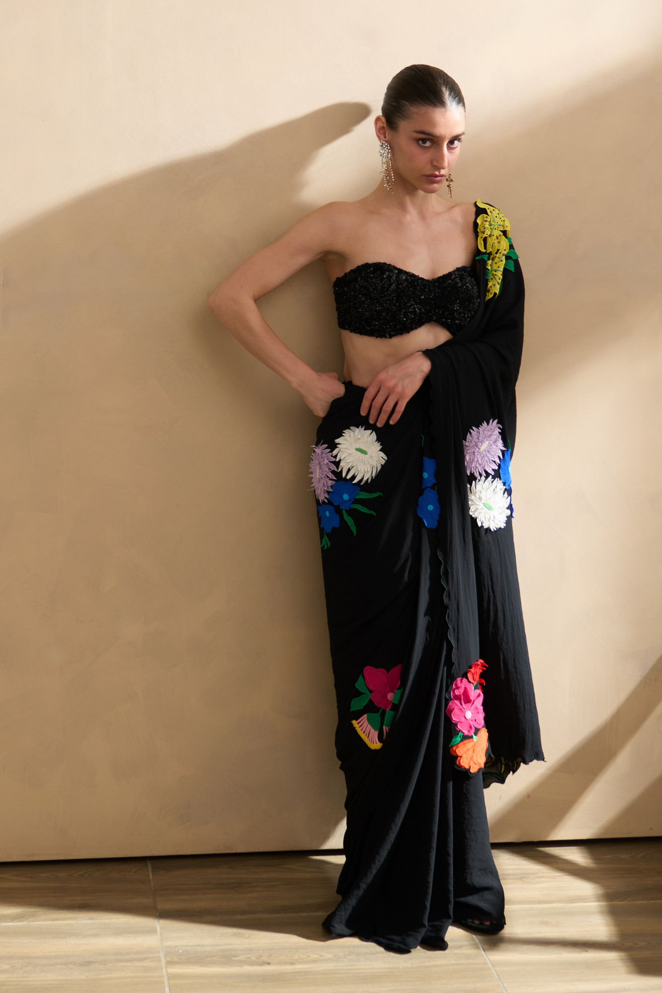GARDEN OF SICILIA BLACK COLOR SARI WITH FLORAL EMBROIDERY ALL OVER AND FULLY SEQUINED BUSTIER BLOUSE