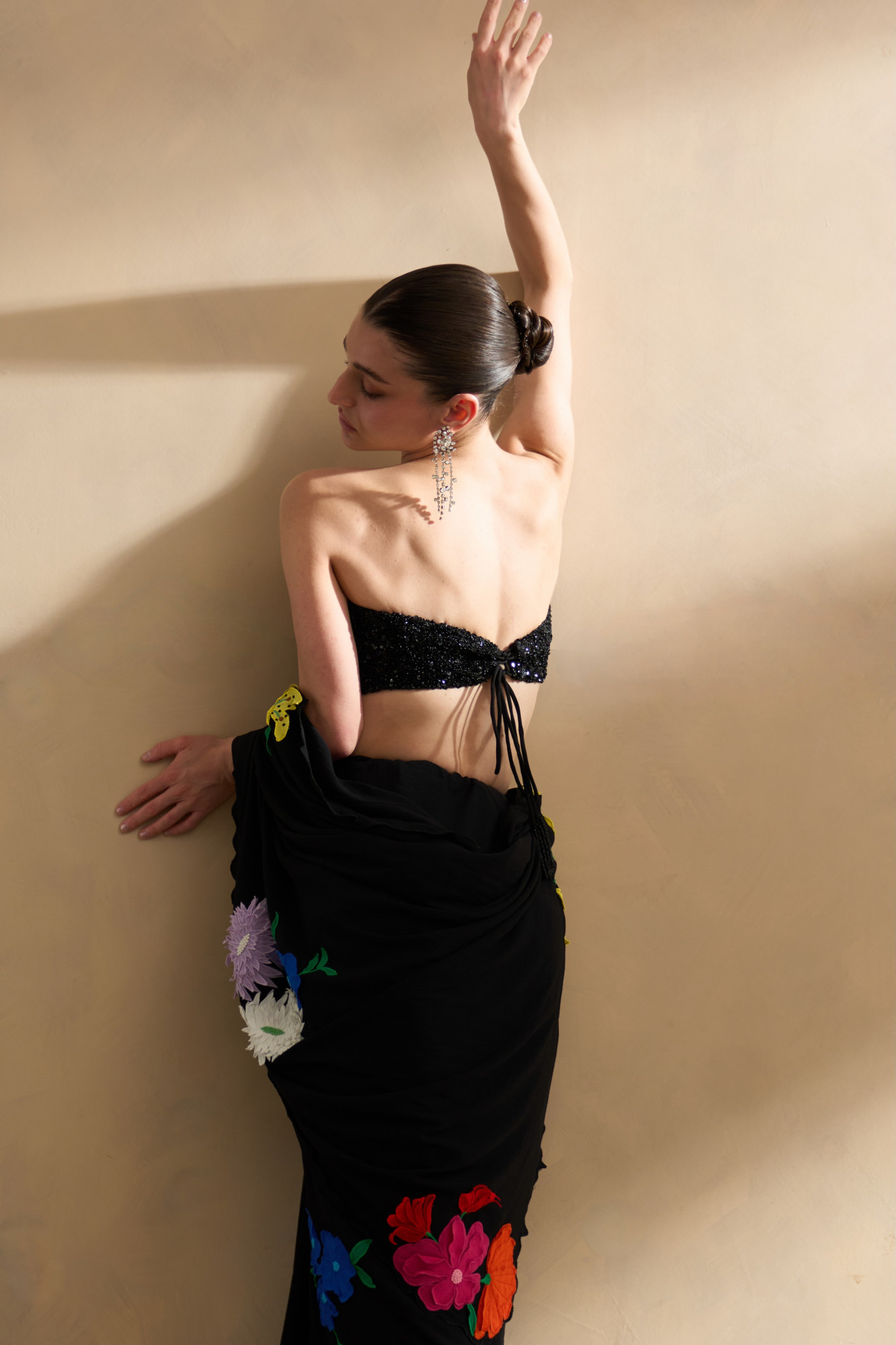 GARDEN OF SICILIA BLACK COLOR SARI WITH FLORAL EMBROIDERY ALL OVER AND FULLY SEQUINED BUSTIER BLOUSE