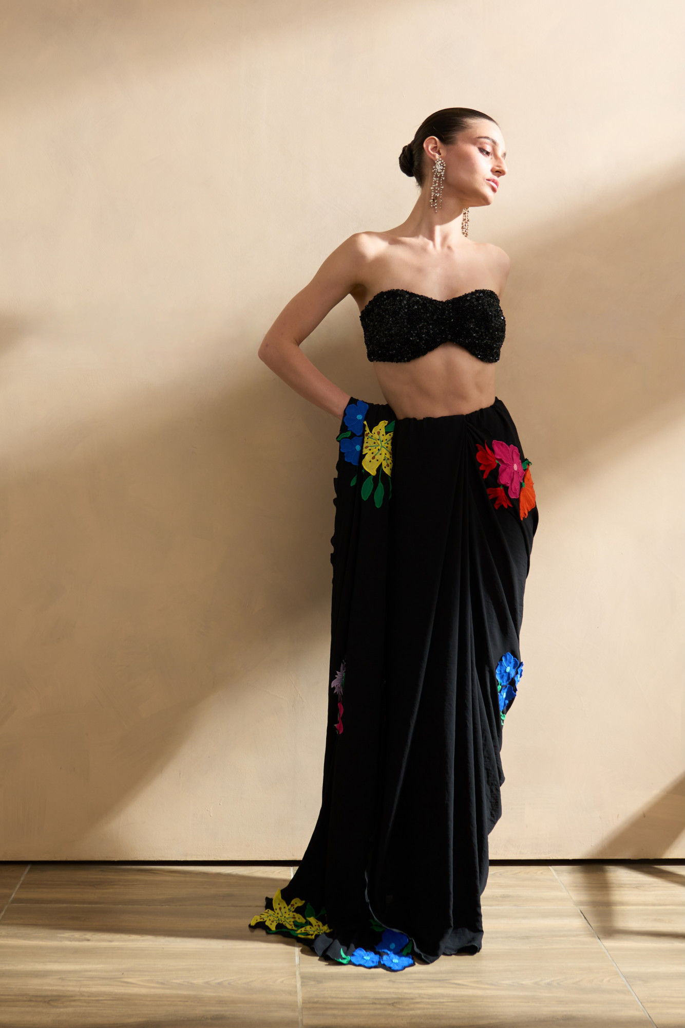 GARDEN OF SICILIA BLACK COLOR SARI WITH FLORAL EMBROIDERY ALL OVER AND FULLY SEQUINED BUSTIER BLOUSE
