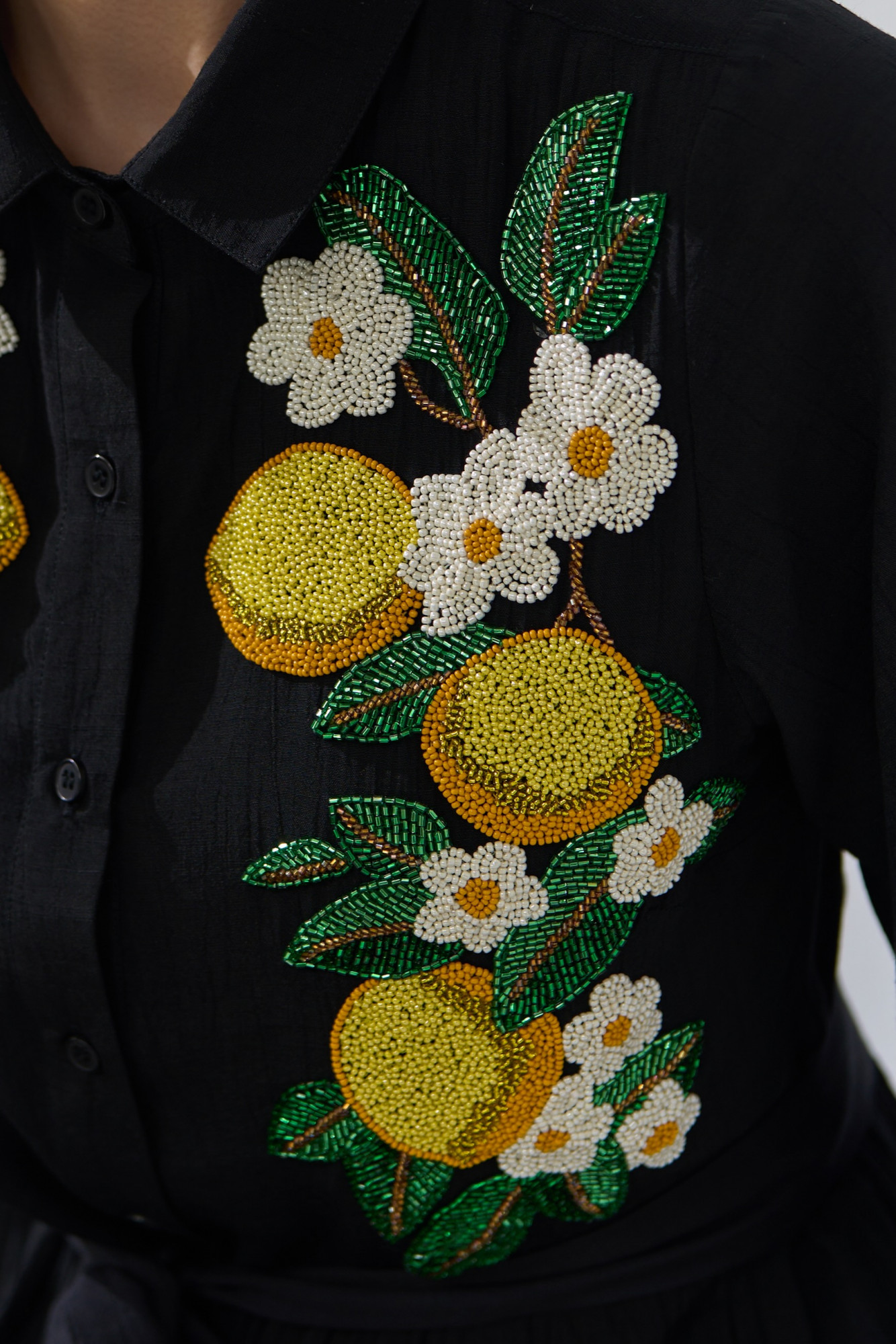 ATELIER RIVIERA BLACK COLOR KNEE LENGTH TIER DRESS WITH FULL SLEEVES AND HANDCRAFTED LEMON EMBROIDERY