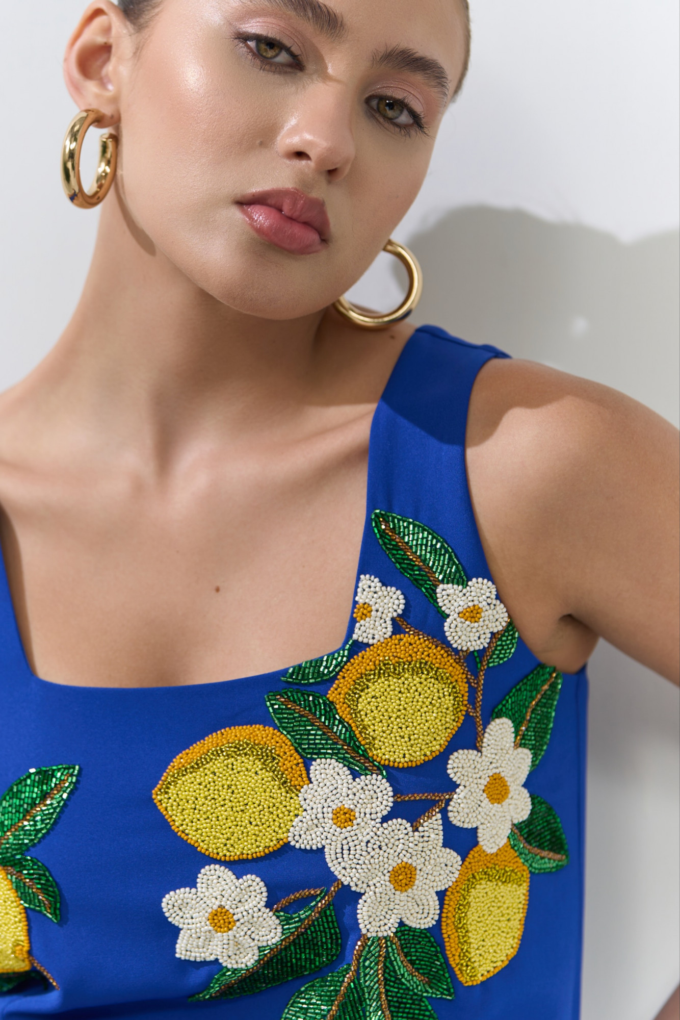 ATELIER RIVIERA BLUE COLOR SLEEVELESS KNEE LENGTH DRESS WITH HANDCRAFTED LEMON EMBROIDERY