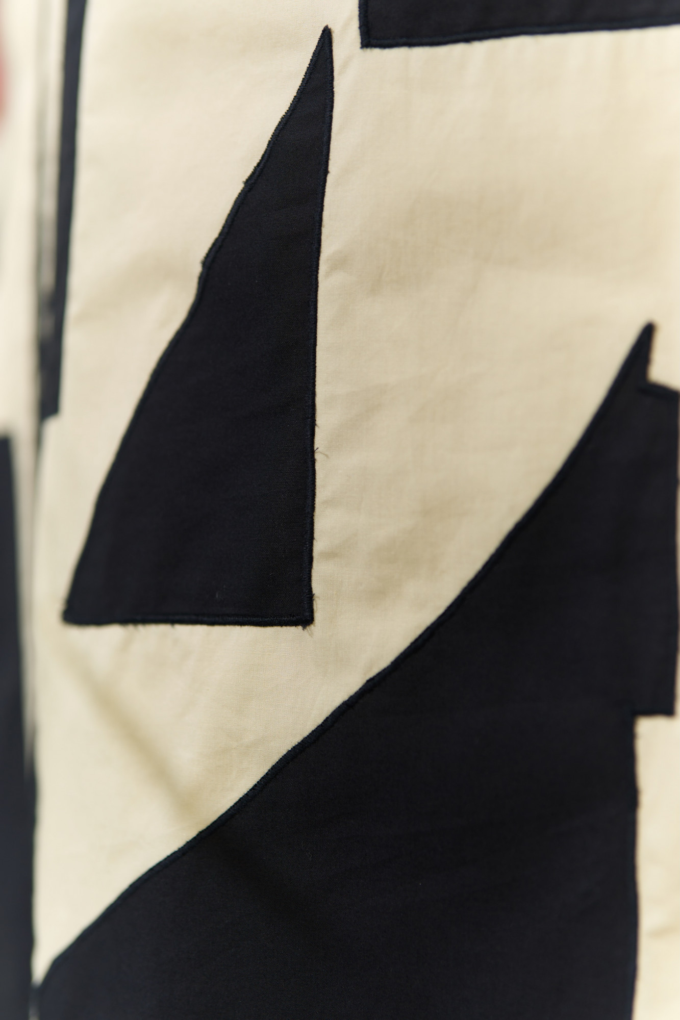 ATELIER RIVIERA BUTTERMILK COLOR COTTON POPLIN SHIRT WITH BLACK FABRIC PATCHWORK  BLACK SOLID PANTS CO-ORD SET