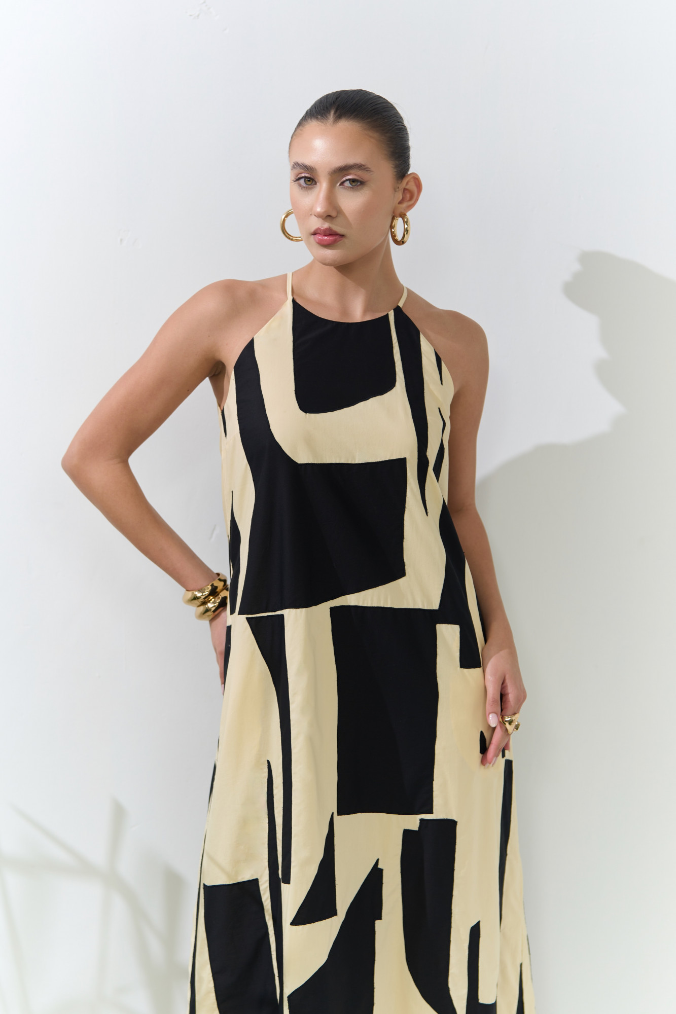 ATELIER RIVIERA BUTTERMILK COLOR POPLIN HALTER CUT MAXI DRESS WITH BLACK FABRIC PATCH WORK